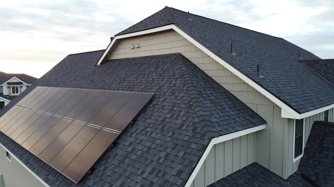 Solar panels on a Boise Idaho home, roof replacement with solar panel removal and reinstallation by Blue Goat Roofing