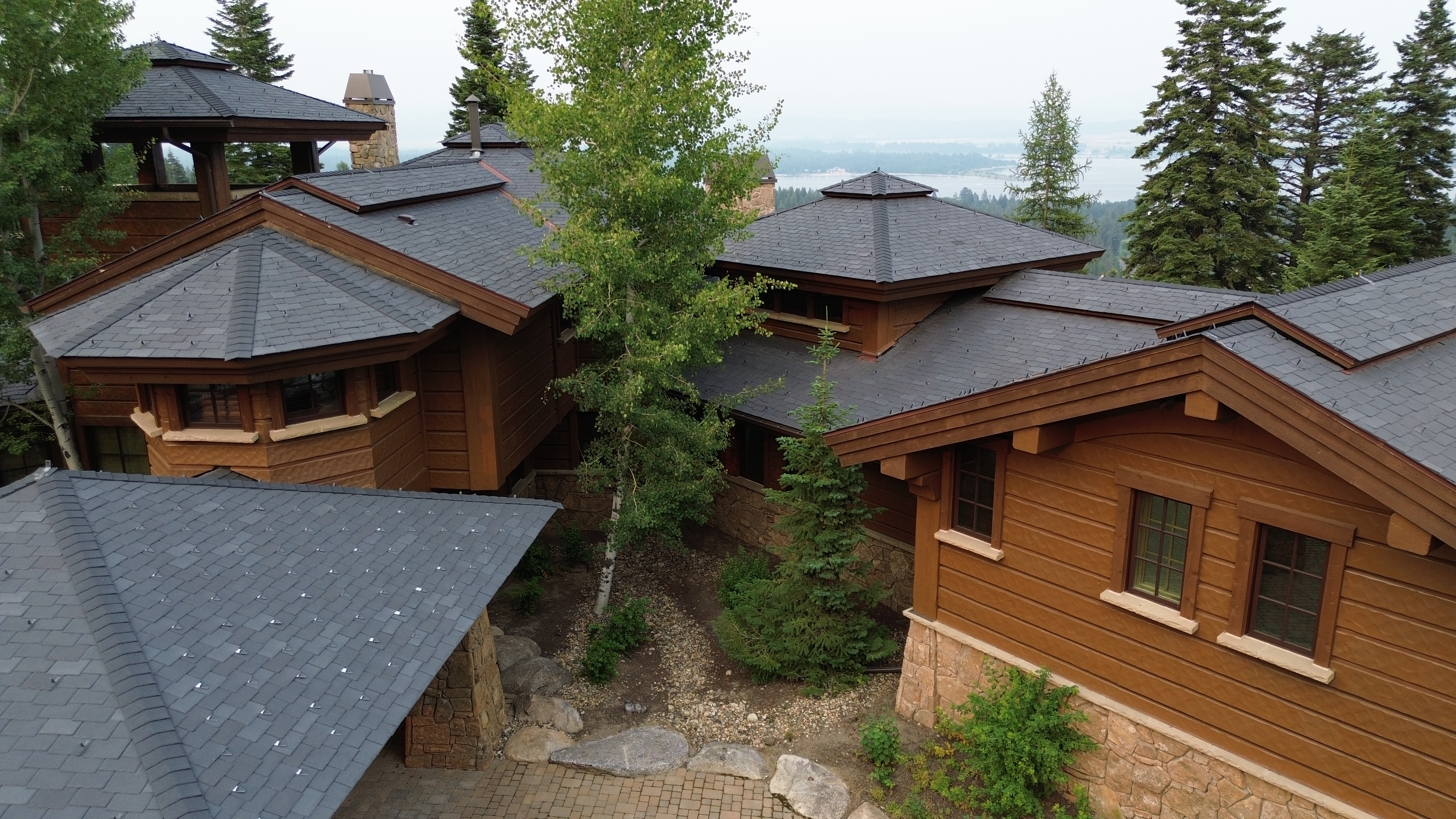 Luxury log estate with Payette Lake views — Valley County roofing by Blue Goat Roofing