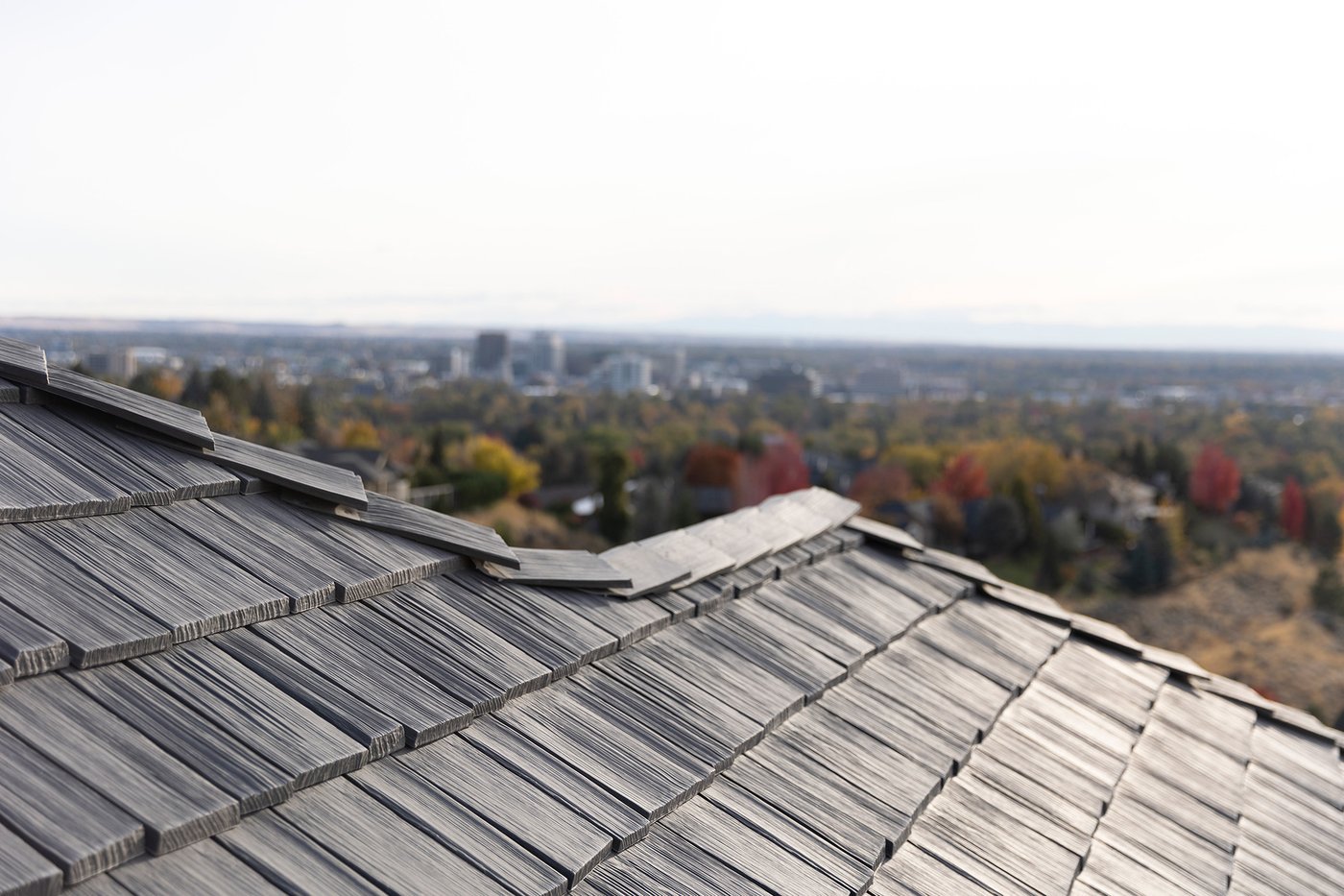 Blue Goat Roofing team member inspecting a residential roof in Boise Idaho
